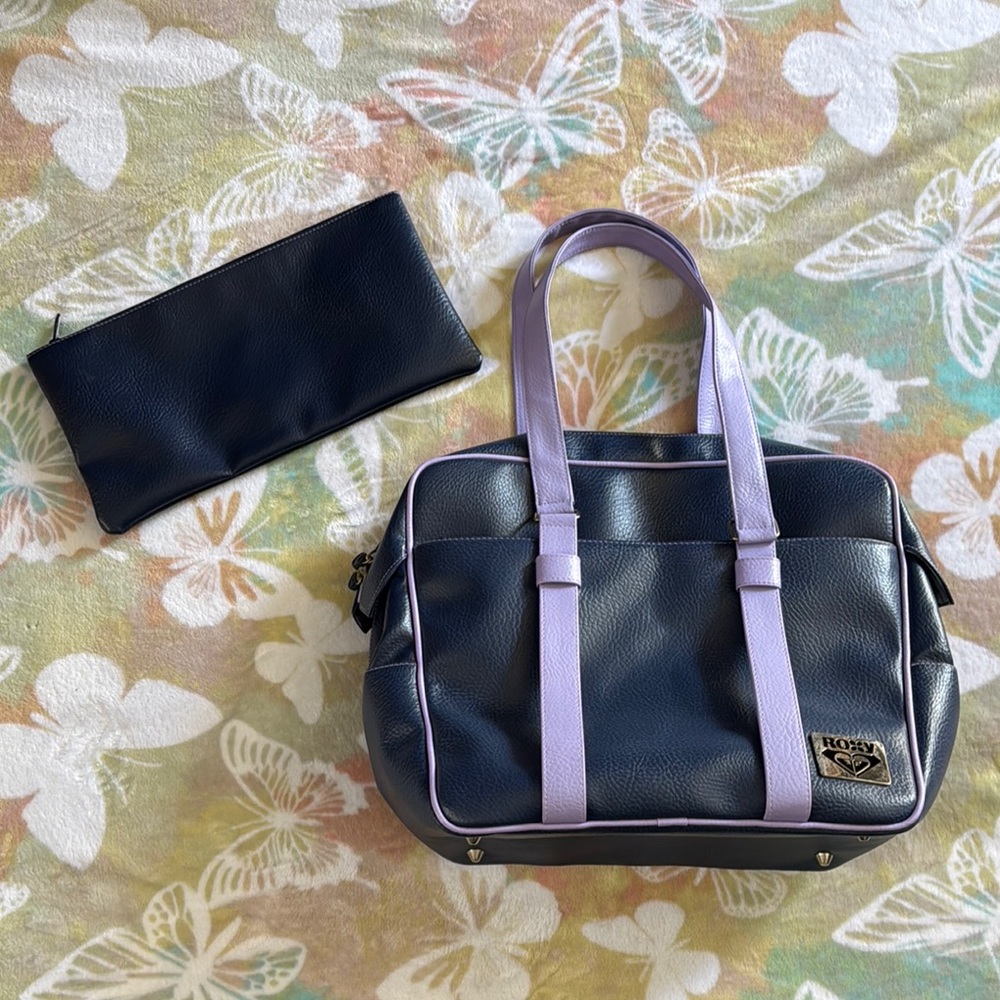 Roxy quicksilver Navy and Lavender travel luggage with Pouch